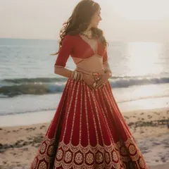 The silhouette of my bride against the sea, her soft waves catching the golden light.