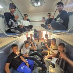All smiles in the train compartment. These travel moments are where the team truly starts to bond, sharing stories and getting excited for the matches ahead.