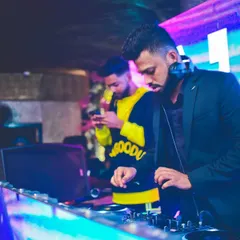 Collaboration is key, even during a solo residency. Here I am at Opa, working the decks alongside another artist, showing the dynamic B2B energy I can bring to the console to keep the night fresh and exciting.