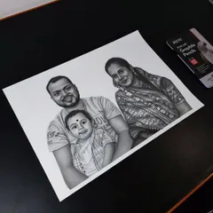 A sweet family portrait of a couple with their young son, a commission from Odisha. I used Brustro graphite pencils to create this heartwarming A3 black and white sketch.
