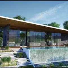The rear view of the same modern bungalow, featuring an infinity pool with a waterfall edge. The design uses large glass walls to seamlessly connect the indoor living spaces with the outdoor deck and lush greenery.