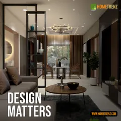 Good design matters. Here, an open-shelf partition defines the dining area without closing it off, while the ring chandelier acts as a centerpiece, proving that functional elements can also be the most beautiful.