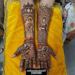 A classic take on the portrait mehndi. The bride and groom figures are drawn in a traditional style, surrounded by peacock motifs and intricate patterns that cover the hands and arms.