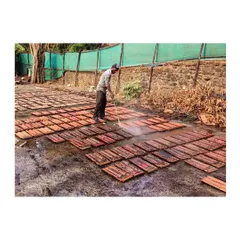 The process of restoring the original Burma teak wood from the roof. Each piece was carefully inspected, cleaned, and treated to preserve the material's natural resistance to decay and reveal its inherent beauty.