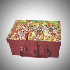 Our Sita Kalyanam invitation box is a work of art. This trunk, adorned with a classic painting of the divine wedding, is designed to hold sweets or dry fruits, making your wedding invitation truly memorable.