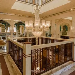 The grand atrium of the Surya Haveli in Jaipur. While my wallpaper is in the adjoining rooms, this view captures the overall sense of opulence and heritage that my designs were created to complement.
