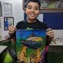 We love celebrating our students' hard work. Shaurya was our best student for this quarter, and here he is with his amazing underwater-themed oil pastel drawing.
