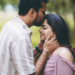 A quiet moment of connection. This close-up shot during an outdoor session captures the pure love and anticipation between partners, a memory to cherish forever.