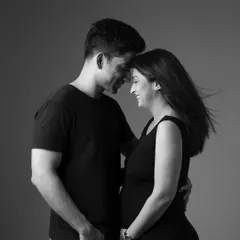 The connection between two people about to become parents is pure magic. This intimate black and white couple portrait captures that gentle, unspoken love.