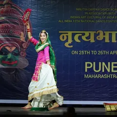 A series of photos from a Gidha performance at a national competition in Pune, showcasing the colorful costumes and lively spirit of this Punjabi folk dance.