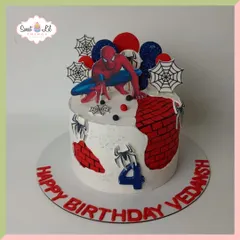 A different take on the Spider-Man theme, this cake features a cool brick wall effect and bold web details. The central Spidey figure is ready for action, making it a thrilling cake for a 4th birthday celebration.
