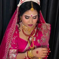 I have a special place in my heart for traditional Bengali bridal makeup. From the intricate chandan art to the bold eyes that complement the mukut, I create an authentic and graceful look that honors your heritage.