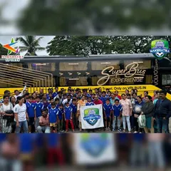 The full squad and supporters ready for the 'Super Bus Experience' on their way to a national tournament.