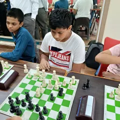 Deep in concentration during a chess competition at our academy. I encourage healthy competition to help students apply the strategic thinking and focus they develop in class.