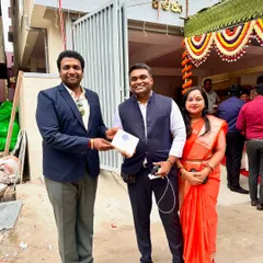 Our Principal Architect, Rohith Krishna, with happy clients at their housewarming. Building strong relationships with the families we work for is central to our philosophy.