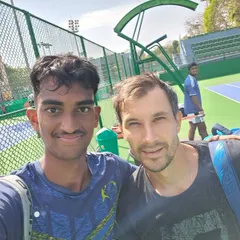 NTC player Mukil with former top 20 ATP player Bernard Tomic, gaining insights from one of the most experienced players on the tour.
