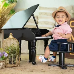 A first birthday is a big deal, and I love creating setups that are as unique as your little one. This piano theme was perfect for a budding maestro, filled with laughter and happy tunes.