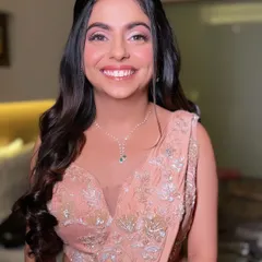 A close-up of this stunning reception look. The makeup is blended seamlessly to create a flawless finish that looks incredible both in person and on camera.