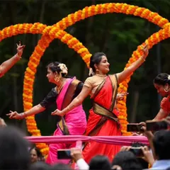 Our ladies' batch performing a traditional Andhra Telangana folk dance during a Ganesha procession. The colorful sarees and graceful movements celebrate the region's rich culture.