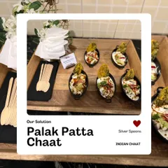 Our Palak Patta Chaat is a signature item, served in unique boat-shaped bowls with a wooden spoon. Each bite is a perfect mix of crispy, creamy, and tangy flavors.