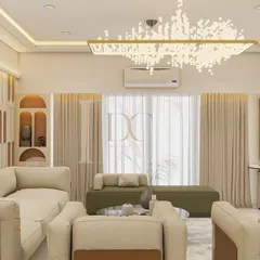 A wide view of a luxurious living area we designed, featuring a stunning modern chandelier as the centerpiece. The layout includes plush, comfortable sofas and an accent lounger, creating multiple seating zones for a large family.