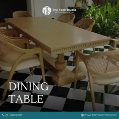 For this farmhouse project in NCR, I crafted a classic dining set from solid teak wood. The table features a robust pedestal base and intricate edge detailing, paired with comfortable armchairs that combine a solid wood frame with natural rattan weaving.