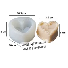 A heart-shaped cake mold, complete with dimensions. This mold is perfect for making celebratory or romantic-themed candles that look like miniature cakes.