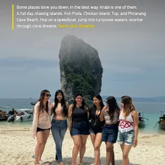 A group of women poses on a beach in Krabi, Thailand. A full day of island hopping to Koh Poda, Chicken Island, and more is a key part of the adventure. Swim, sun, breathe.