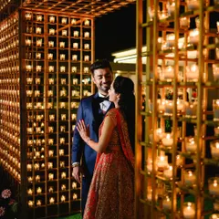 For a couple that wanted pure romance, I created this signature candle wall. It makes for a stunning, warm backdrop for reception photos and creates an unforgettable, intimate atmosphere that sets a trend rather than follows one.