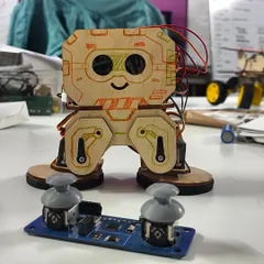 Another new bot in the making! This little guy is controlled by a joystick, giving students a tangible way to interact with the robot they've just built.