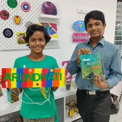 So proud of their creations! These cousins spent their vacation time at the studio making a colorful nameplate and a cool banner.