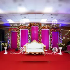 I believe every milestone deserves elegance. This 50th golden anniversary stage is framed with lush, real flower garlands against vibrant pink drapery, creating a sophisticated and timeless backdrop for celebrating a lifetime of love.