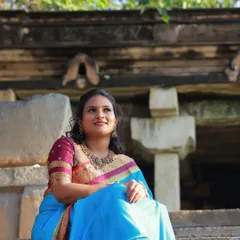 A classic maroon blouse with delicate gold embroidery, a versatile piece that pairs beautifully with many silk sarees for a traditional yet elegant look.
