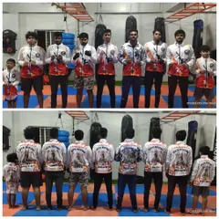 Our team, united and ready. Wearing our official team jackets, these fighters represent the spirit and strength of the Combatant Muay Thai Academy.