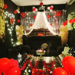 This is how we do romantic celebrations. Imagine just you and your special someone, surrounded by lights, balloons, and a cozy canopy, ready to watch your favorite movie. It's the perfect setup for a Valentine's surprise or a memorable birthday.