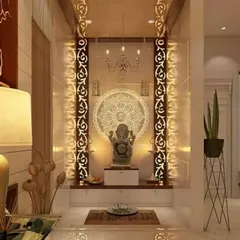 A modern pooja unit with backlit decorative panels. The design is clean and elegant, creating a bright and peaceful space for prayer and meditation.