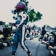 A stylish shot of one of our drivers walking through the pit lane, ready for the final round of the Rotax championship.