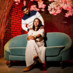 Another beautiful portrait from the indoor set. The cozy setting and romantic props help couples feel comfortable and express their love naturally.