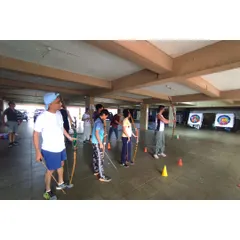 Students lining up for a team event. The cones mark the shooting line, ensuring everyone maintains a safe distance.