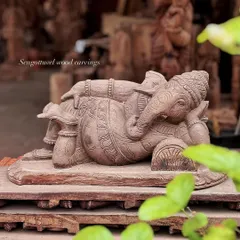 A beautifully captured image of our reclining Ganesha, exuding an aura of peace and contentment. This piece is perfect for a tabletop or a quiet corner in your home.