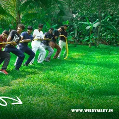 Two teams face off in a classic Tug of War match. This activity is always a highlight for our group bookings, bringing out the fun and competitive side in everyone.