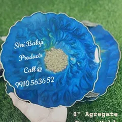 A stunning example of resin art coasters made with our supplies. The vibrant blue and gold create a beautiful geode effect.