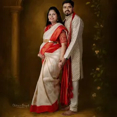 The elegance of tradition is timeless. We specialize in creating painterly, fine-art portraits that honor your cultural heritage, like this beautiful couple in classic Indian attire.