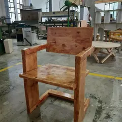 Built with strong, clean lines, this solid wood armchair is a testament to fundamental woodworking principles. The student focused on creating robust joinery and a functional form, resulting in a durable and timeless piece.