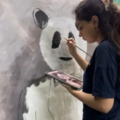 Working on a custom panda portrait. I often use a reference image on my tablet to ensure I capture the details just right, even in a more stylized piece.