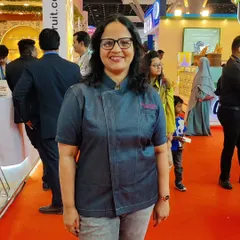 Here I am in my element. As a baker, I consider myself a "Learner for Life," always refining my skills and experimenting with new techniques to bring you the best possible cakes.