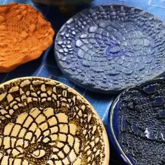 A collection of beautiful, textured bowls and plates created during our fundraiser event. Many of these handmade ceramics were also sold to raise additional funds.
