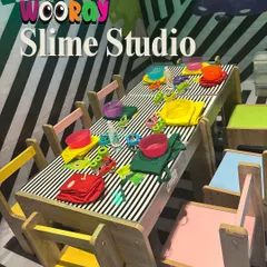 A look inside our vibrant and colorful Slime Studio. With its fun striped decor and individual creation stations, it's the perfect setting for a gooey and creative adventure.