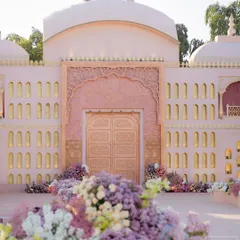 The grand entrance to 'Saanjh Niwas', where muted colors, clean lines, and artisanal florals came together. This facade was designed to be rooted in culture yet reflect a new, modern India.