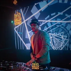 As a VDJ, I mix visuals live with the music to create a fully immersive experience. Here you can see the custom graphics projected on the large screen behind me, adding another layer to my Bollywood and Punjabi sets.